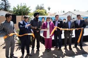 Pictured: a ribbon cutting ceremony