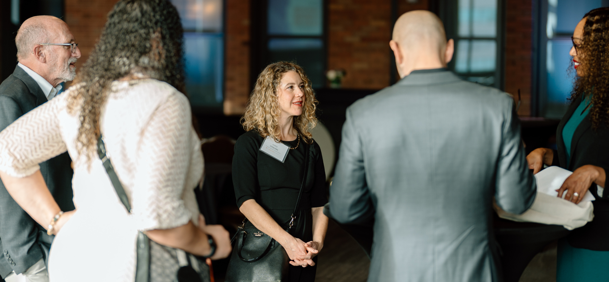 Pictured:  Principals of Capitol Impact in conversation.