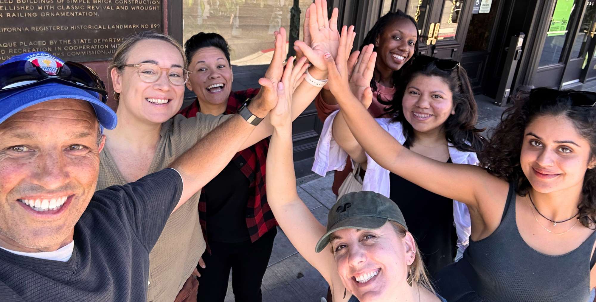 Pictured:  The Capitol Impact team high-fiving